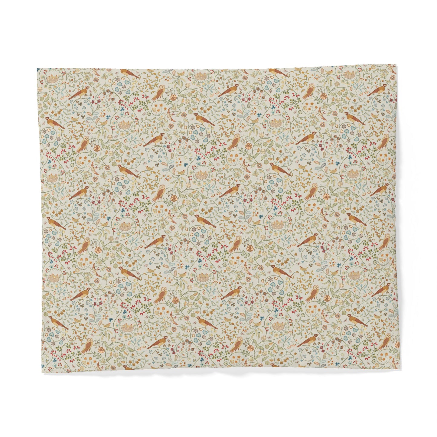 A square fabric item, likely a placemat or napkin, featuring a dense vintage-style botanical and bird pattern on a light cream background. The pattern includes muted green leaves, small blue and pink floral details, and scattered brown birds, all set against a clean white background.