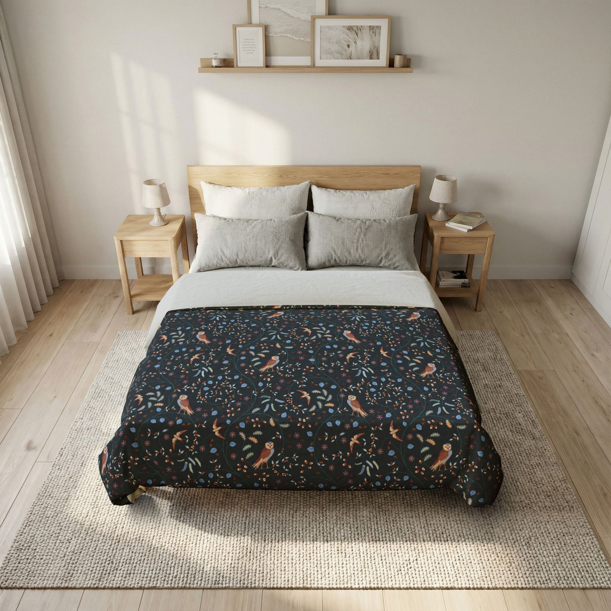 Bedroom with floral comforter on a bed, wooden nightstands, and framed pictures on the wall.