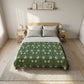 Bedroom with a wooden bed frame, gray bedding, and side tables.