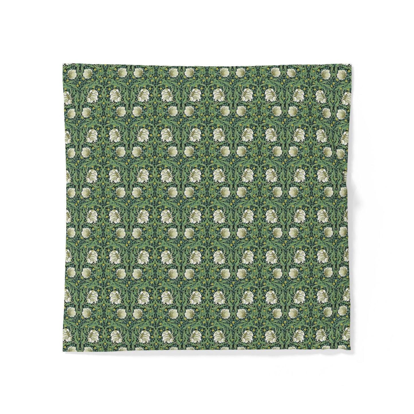 Green fabric with white floral pattern on a white background