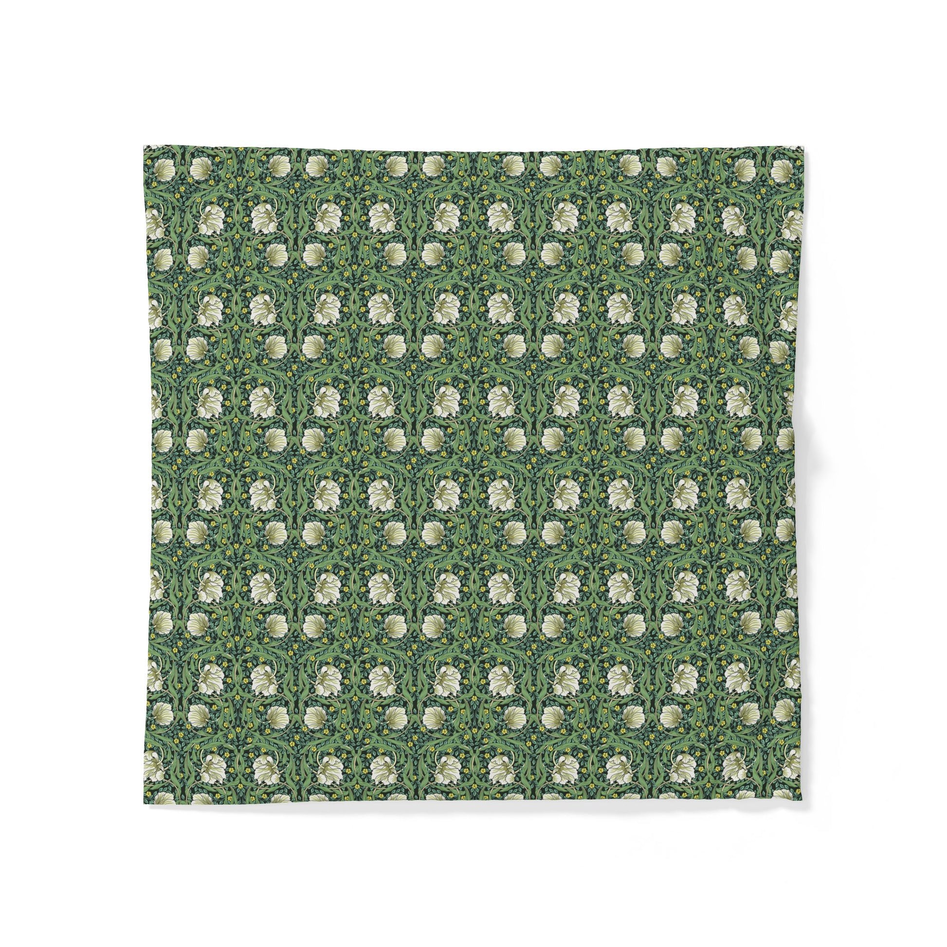Green fabric with white floral pattern on a white background