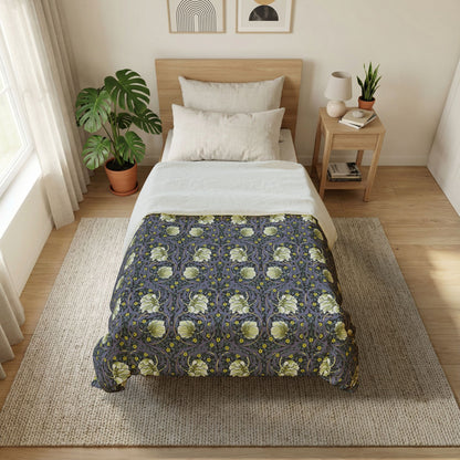 Bedroom with a floral-patterned comforter on a bed, wooden nightstand, and plants.