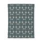 Patterned cotton fabric duvet cover with floral design on a blue background