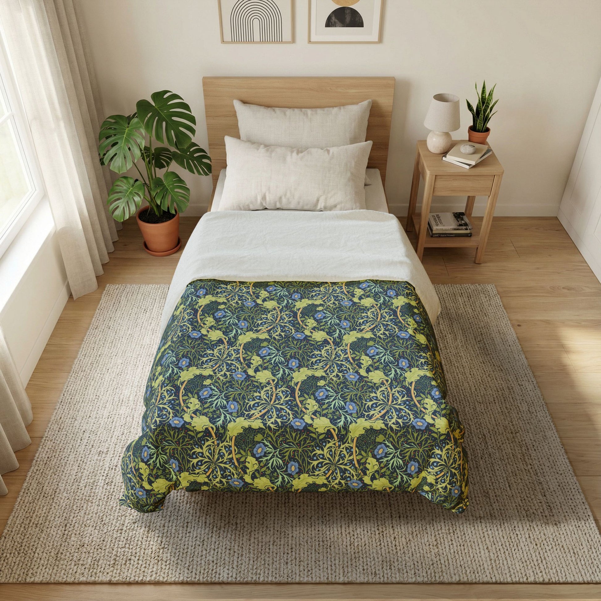 Bedroom with a floral comforter on a bed, plants, and a nightstand.