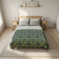 Bedroom with a wooden bed frame, gray bedding, and side tables.