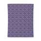 Patterned cotton duvet cover with a floral design on a purple background