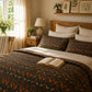 Bedroom with floral bedding, open book, and decorative elements.