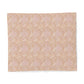 Patterned beige fabric on a white background