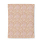 Patterned paper with a beige and pink design on a white background