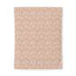 Beige patterned fabric on a white background