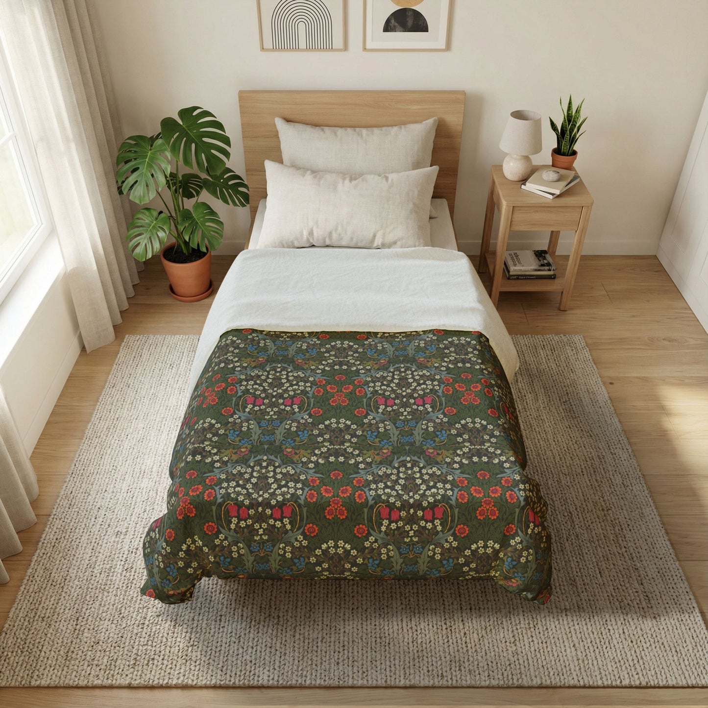 Bedroom with floral-patterned comforter on a bed, side table with lamp and books, and plants.