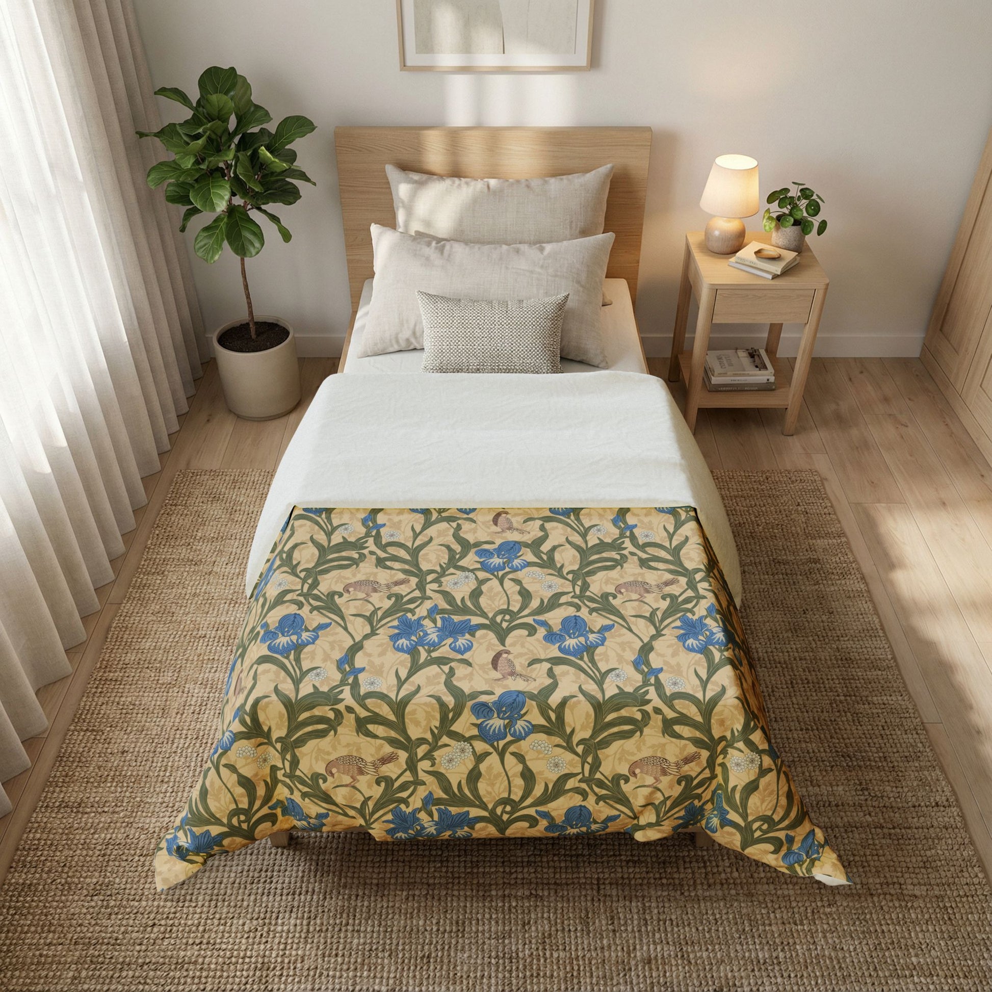 Bedroom with a floral-patterned comforter on a bed, nightstand, and plants.