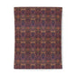 A rectangular textile or fabric panel with an intricate repeating floral and botanical pattern in deep purple, burgundy, rust orange, and green, shown flat against a plain white background.