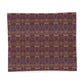 A square textile or fabric sample with an intricate repeating ornamental pattern in dark purple, burgundy, brown, and muted gold, displayed flat against a white background.