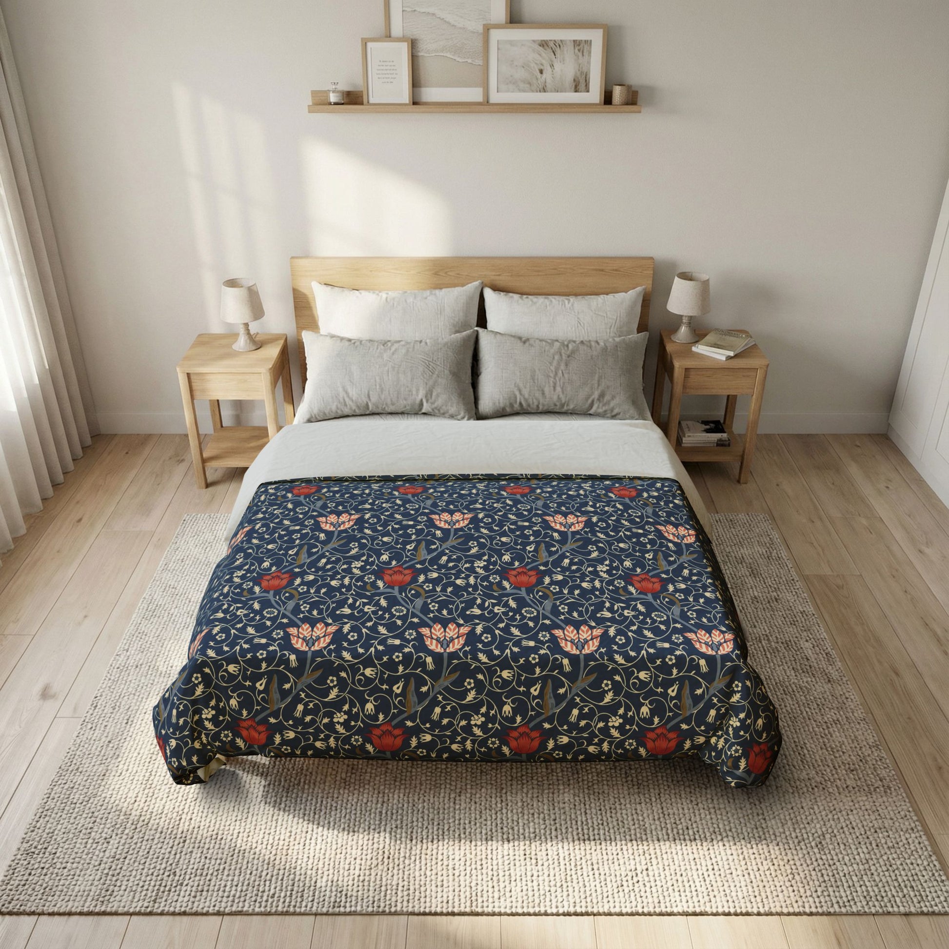Bed with floral patterned comforter in a bedroom setting