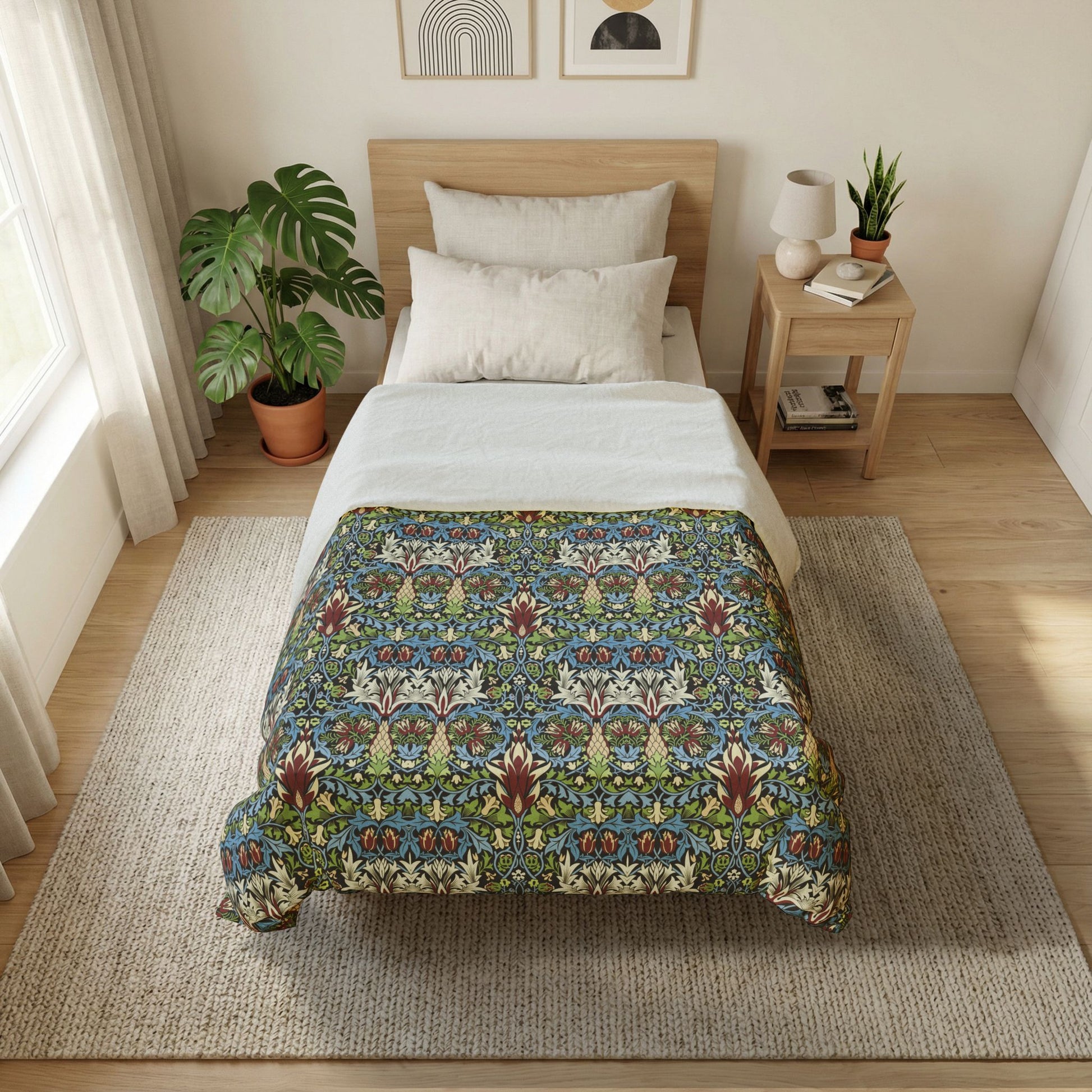 Bedroom with a bed featuring a patterned comforter, nightstand, and plants.