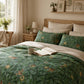 Bedroom with green patterned bedding and a book open on the bed.