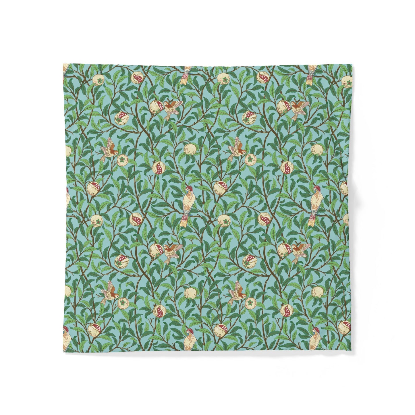 Patterned cotton duvet cover with floral and bird design on a blue background