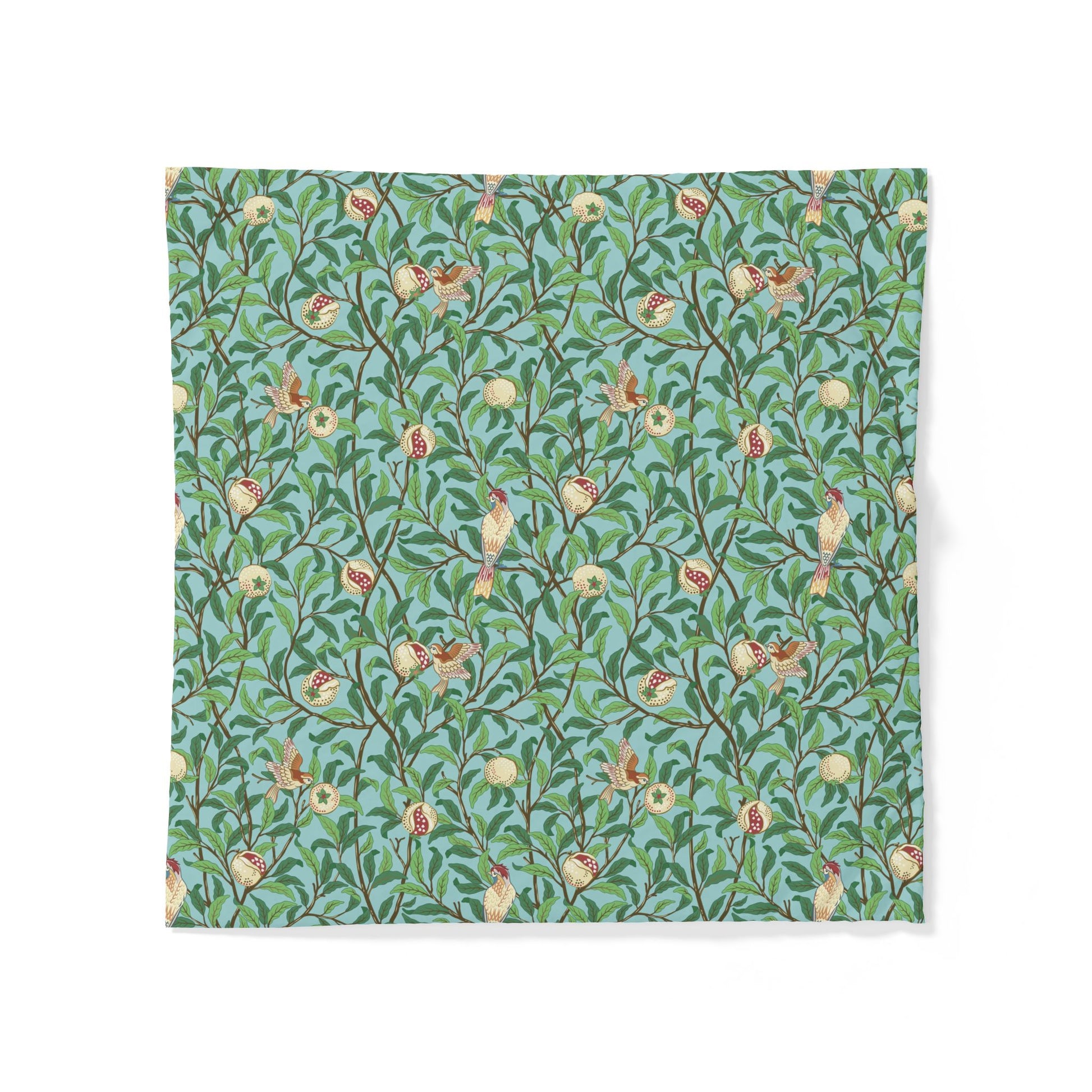 Patterned cotton duvet cover with floral and bird design on a blue background