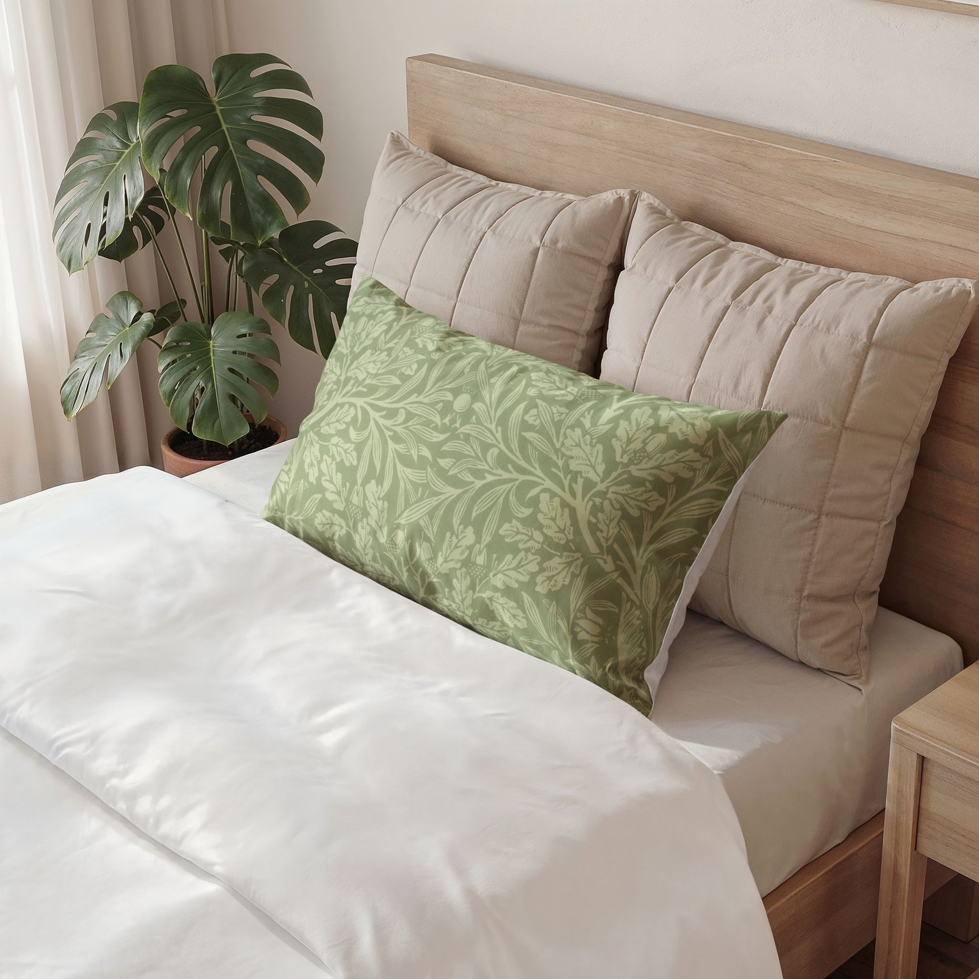 Decorative pillow on a bed with a wooden headboard and a plant in the background