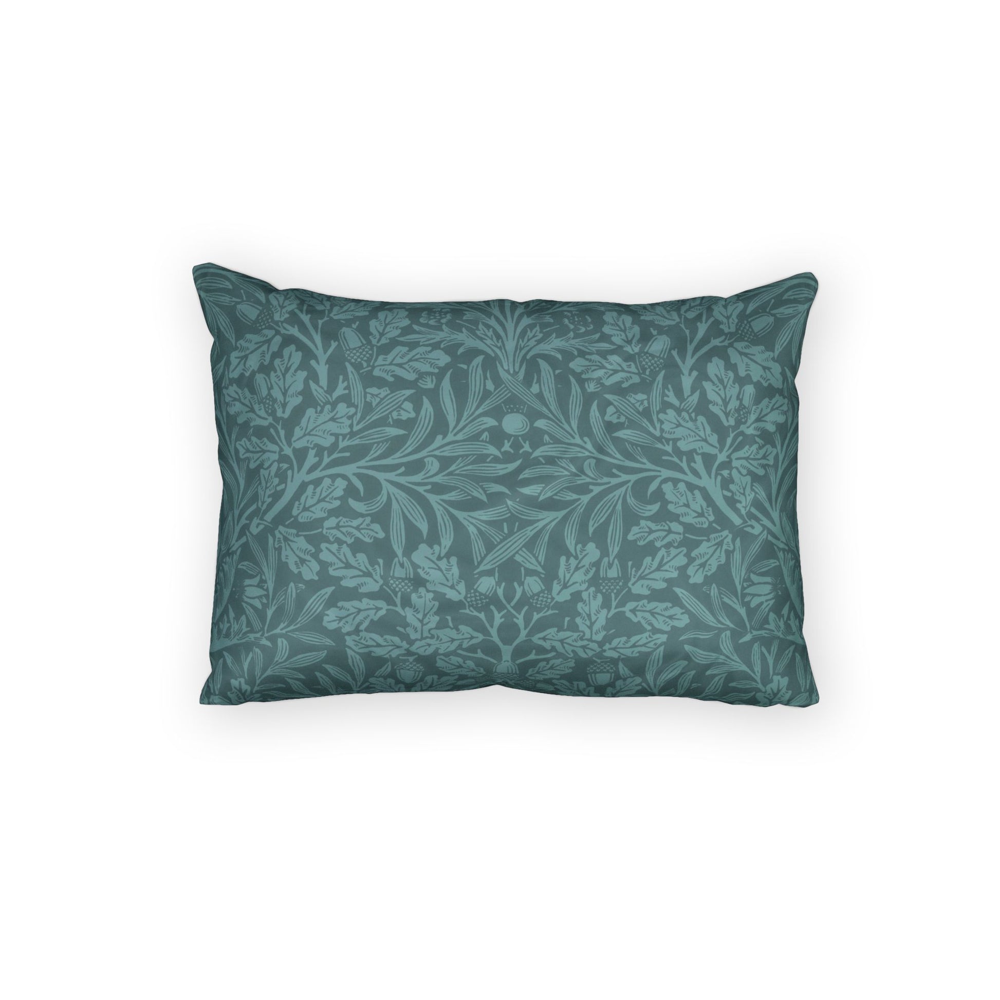 Teal patterned pillow on a white background