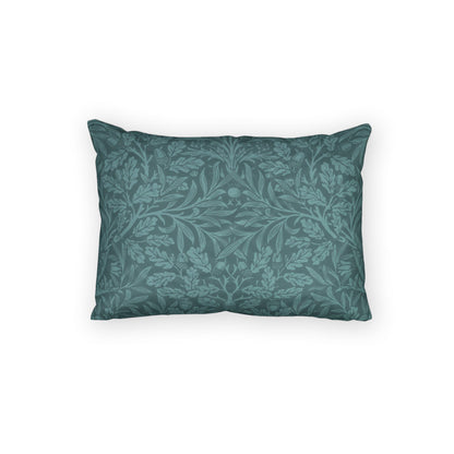Teal patterned pillow on a white background