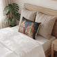 Decorative pillow with religious design on a bed in a bedroom setting