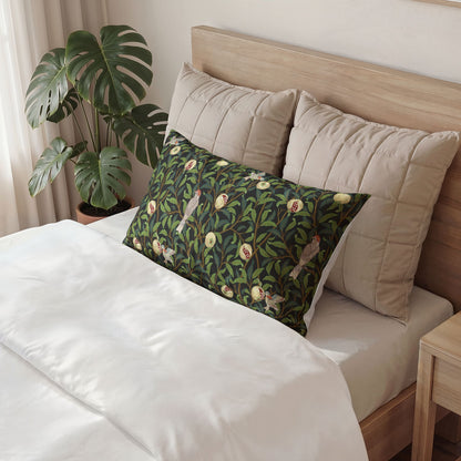 Decorative pillow with bird pattern on a bed in a bedroom setting