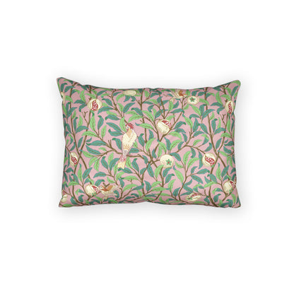 Decorative pillow with floral and bird pattern on a white background
