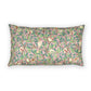 Decorative pillow with a floral and bird pattern on a white background