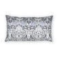 Decorative pillow with floral and bird pattern on a white background