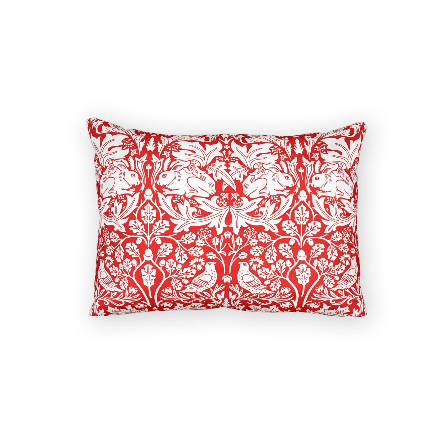 Red pillow with white floral pattern on a white background