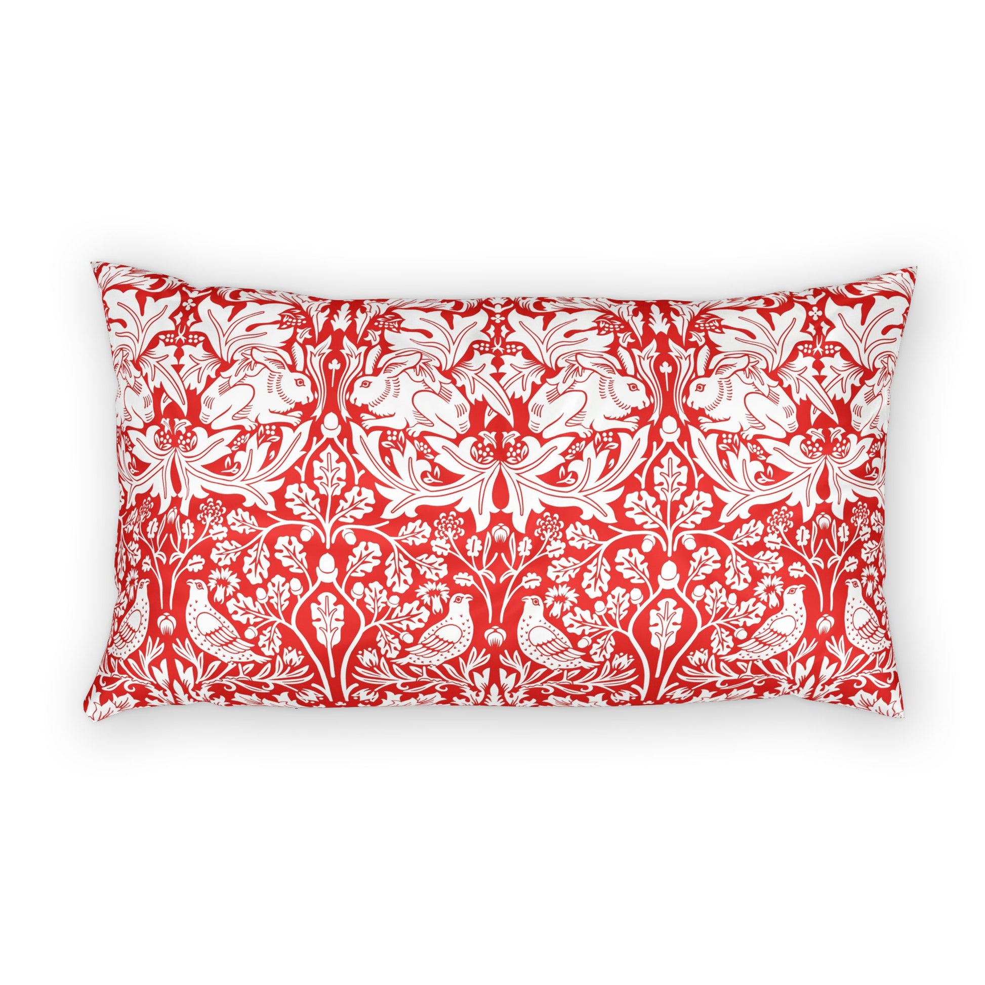 Decorative pillow with red and white floral and animal pattern on a white background