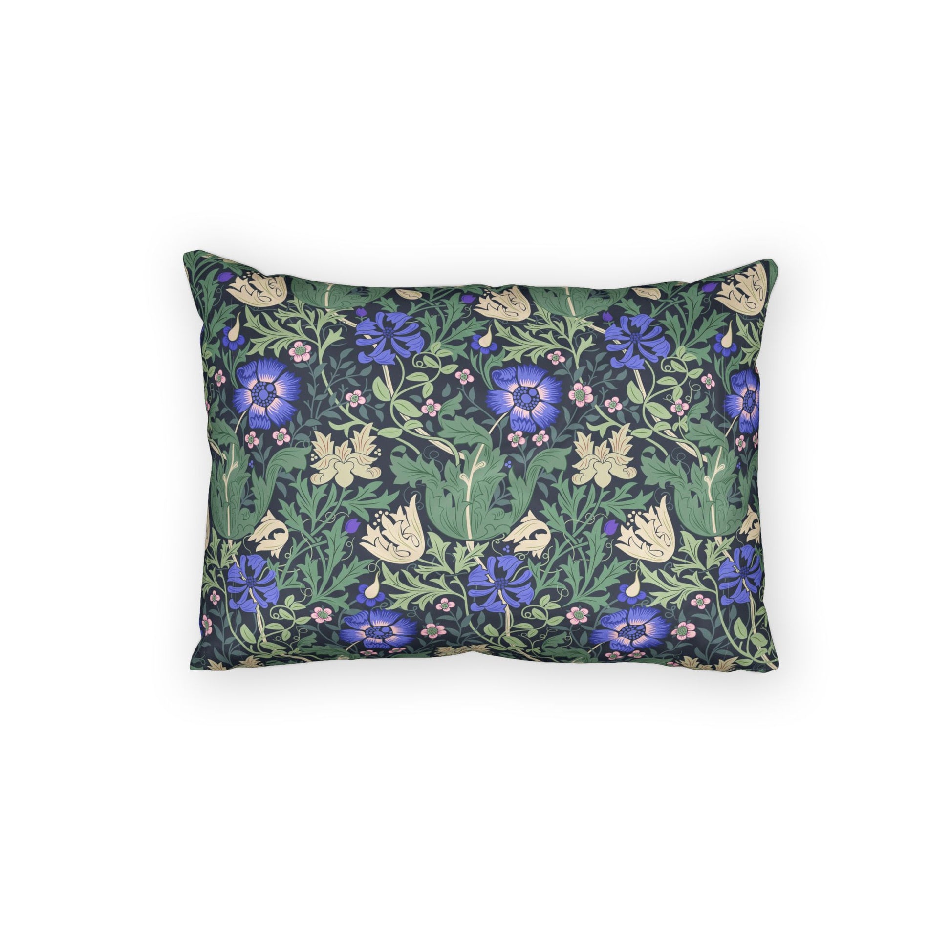 A rectangular decorative throw pillow featuring a dense floral and botanical pattern with blue-purple flowers, green leaves, and cream butterfly motifs on a dark background, shown against a plain white studio backdrop.