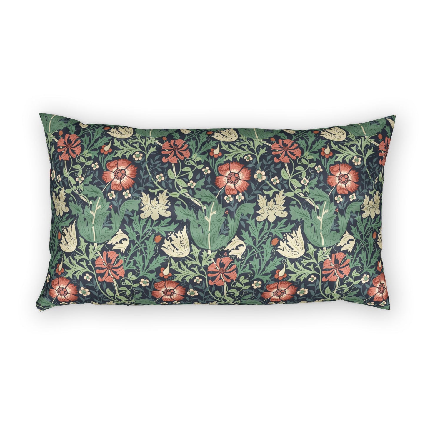 A rectangular throw pillow featuring a dense botanical pattern with red poppies, green leaves, and cream flowers on a dark navy background, shown against a plain white studio backdrop.