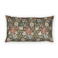 A rectangular lumbar throw pillow featuring a classic William Morris-style floral and botanical pattern in muted olive green, terracotta, cream, and beige tones, shown against a plain white background.