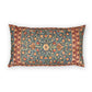 Decorative pillow with intricate floral pattern on a white background