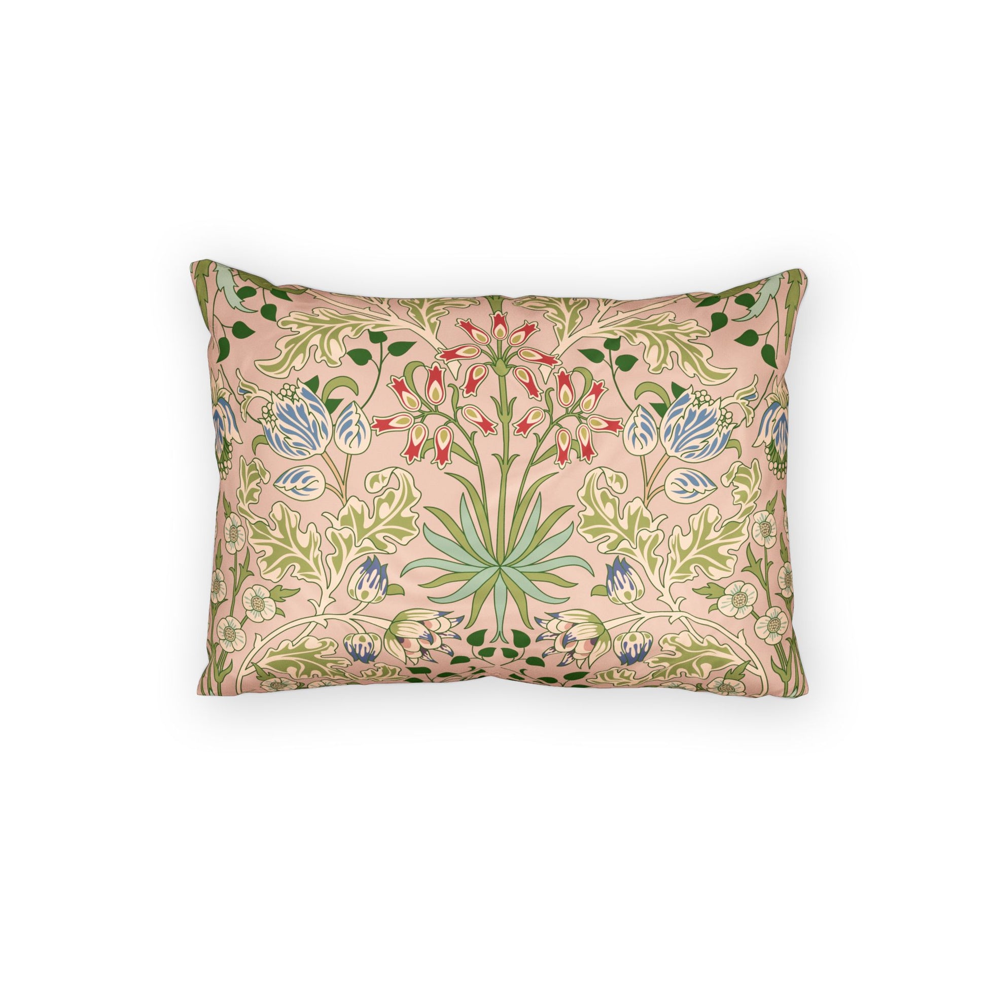 A rectangular decorative throw pillow featuring a vintage botanical pattern with green leaves, blue flowers, and red accents on a dusty pink background, shown against a plain white studio backdrop.