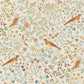 A repeating vintage-style botanical pattern on a warm cream background, featuring illustrated birds, flowers, leaves, vines, and small decorative motifs in muted green, blue, rust orange, and tan.