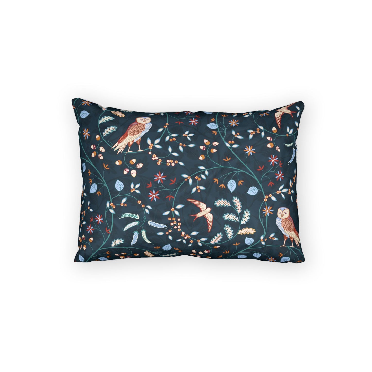 A rectangular throw pillow featuring a dark navy blue background with a detailed botanical and avian pattern of owls, birds, flowers, and leaves in muted orange, beige, and light blue tones, shown against a plain white background.