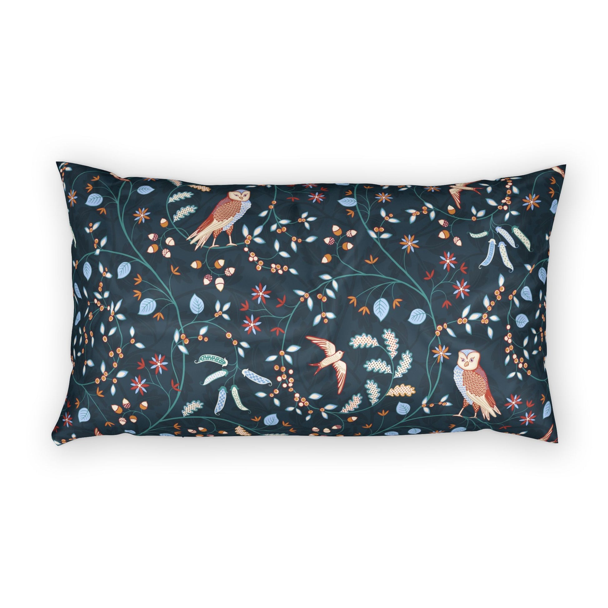 A rectangular throw pillow featuring a dark navy blue background with a detailed botanical and avian pattern of birds, flowers, and leaves in muted teal, brown, and light blue tones.