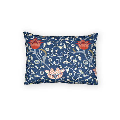 A rectangular decorative throw pillow featuring a navy blue background with a classic floral and vine pattern in cream, coral red, and muted gold, shown against a plain white background.