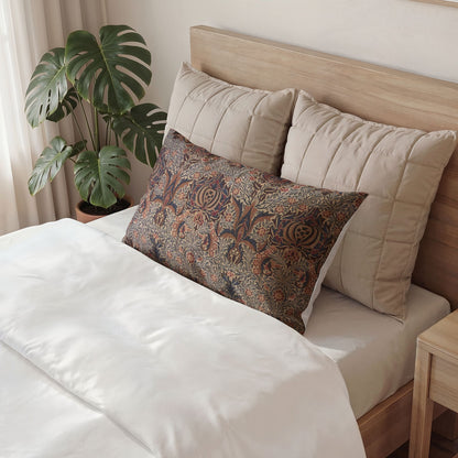 Neatly made bed with decorative pillows and a plant in the background