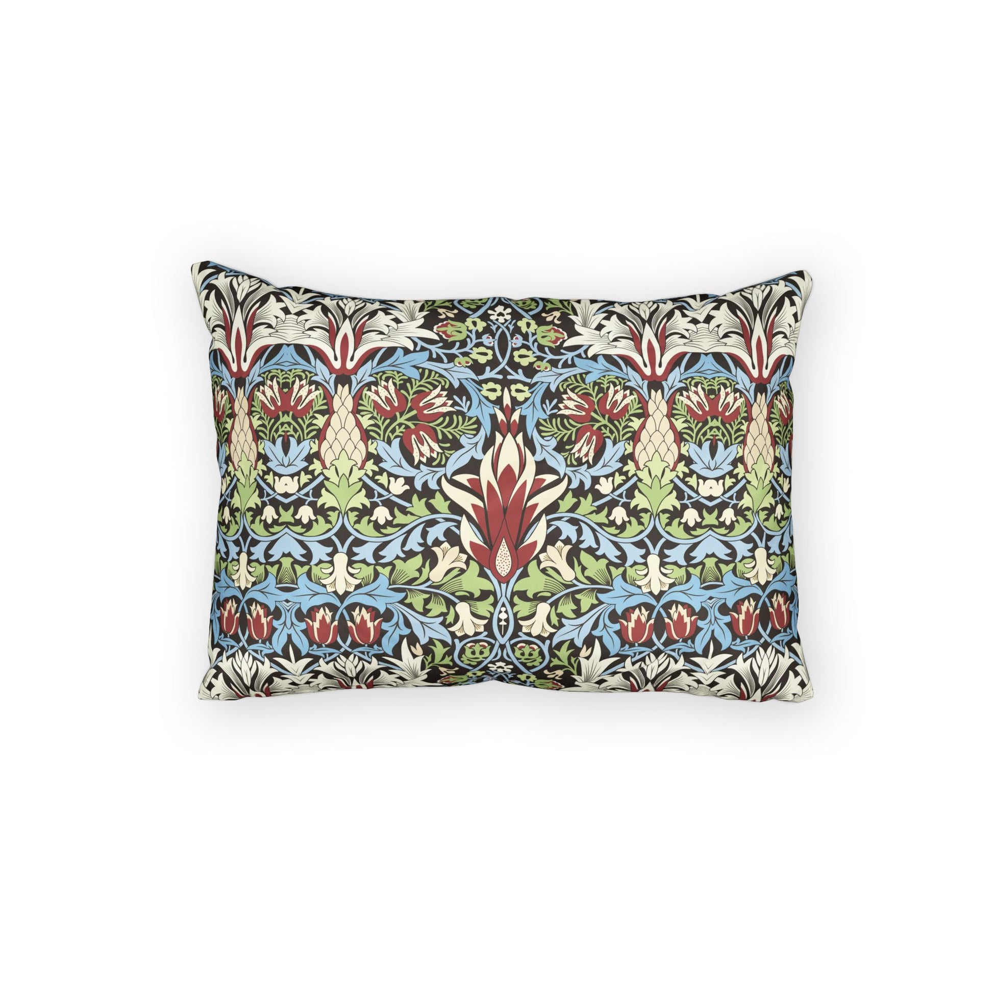 A rectangular decorative throw pillow featuring a dense, symmetrical botanical pattern in green, blue, red, and beige, set against a plain white background.