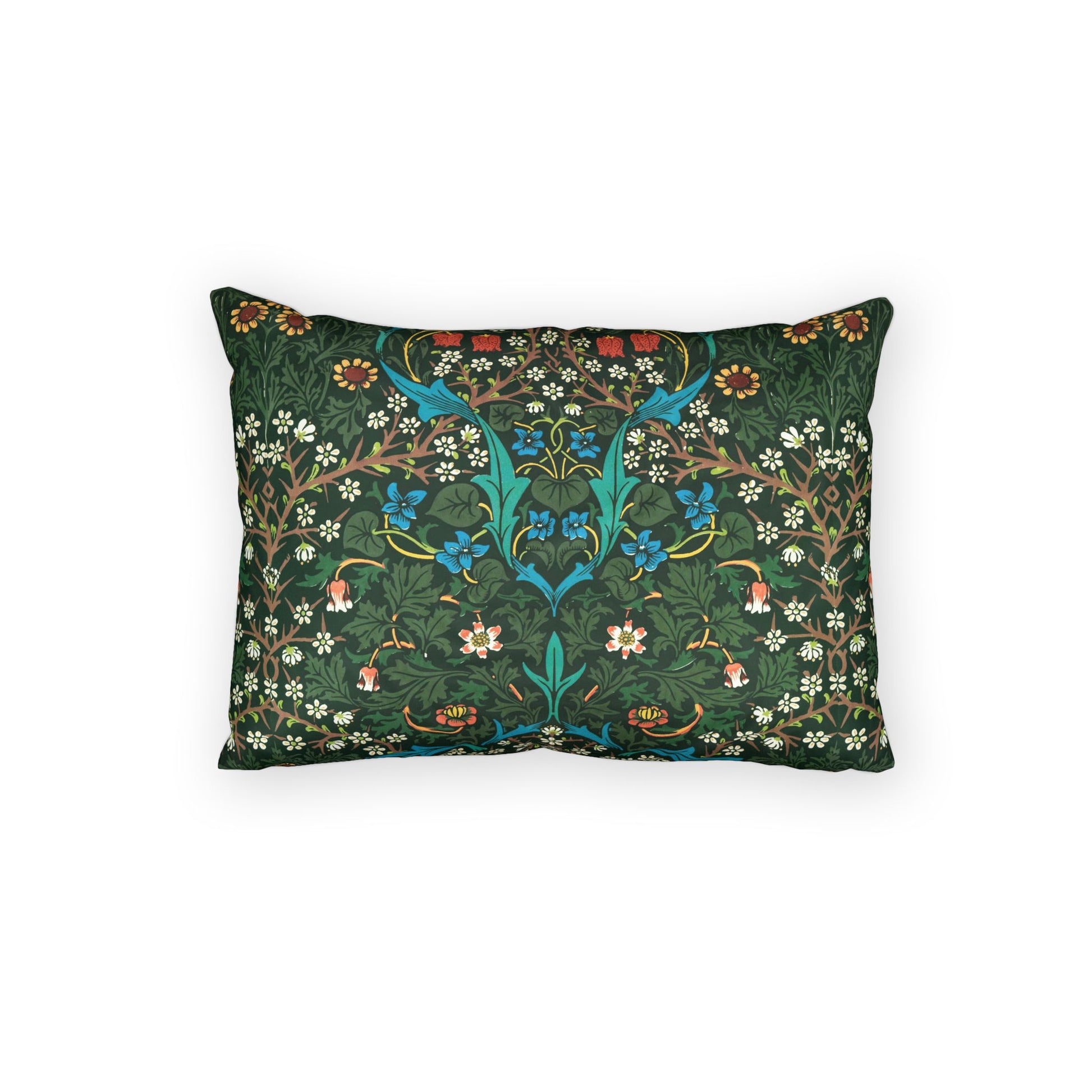 A rectangular decorative throw pillow featuring a dense, symmetrical botanical pattern in dark green, teal, blue, white, and orange on a solid white background.