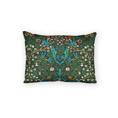 A rectangular decorative throw pillow featuring a dense, symmetrical botanical pattern in dark green, teal, blue, white, and orange on a solid white background.