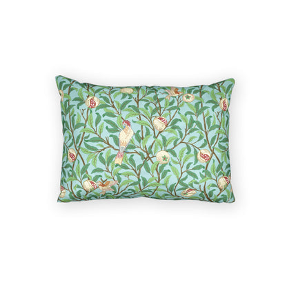 Decorative pillow with bird and floral pattern on a white background