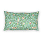 Decorative pillow with floral and bird pattern on a white background