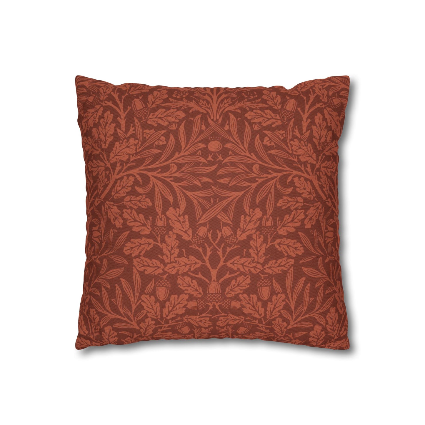 Decorative pillow with intricate leaf pattern on a white background
