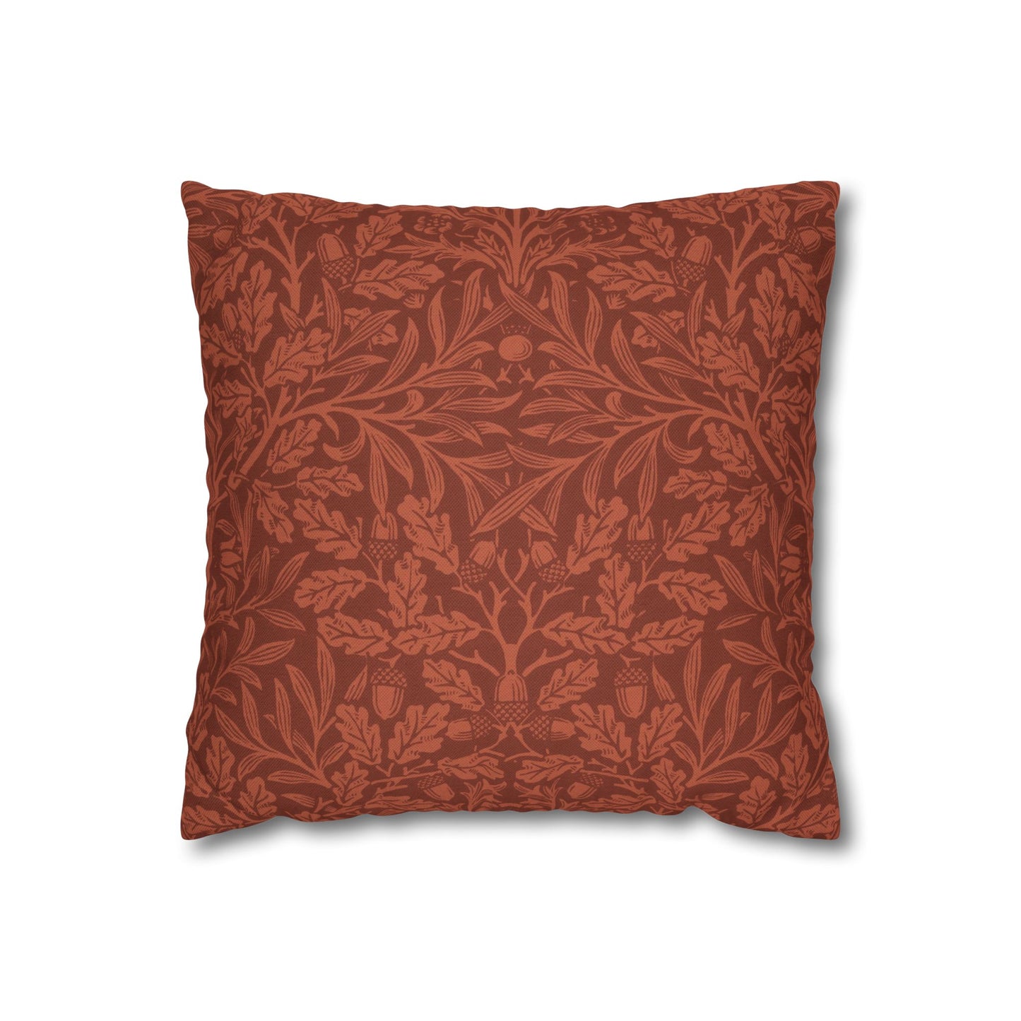 Red floral patterned pillow on a white background